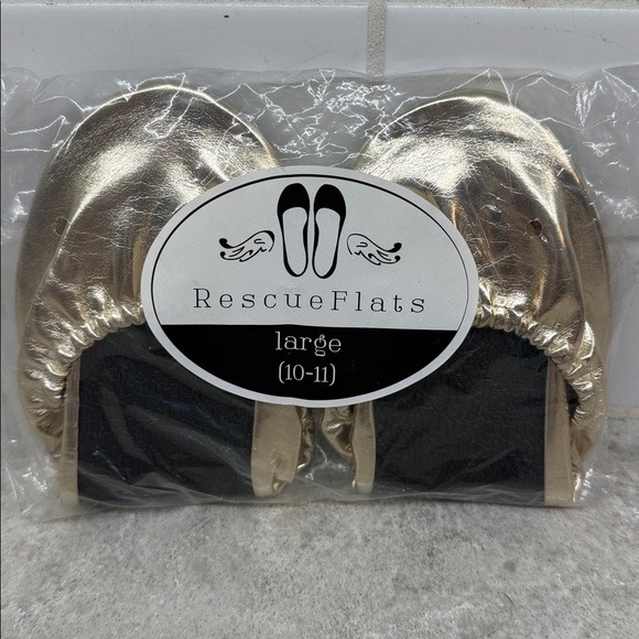 Gold and Black Rescue Flats. Brand new in package - Picture 1 of 2